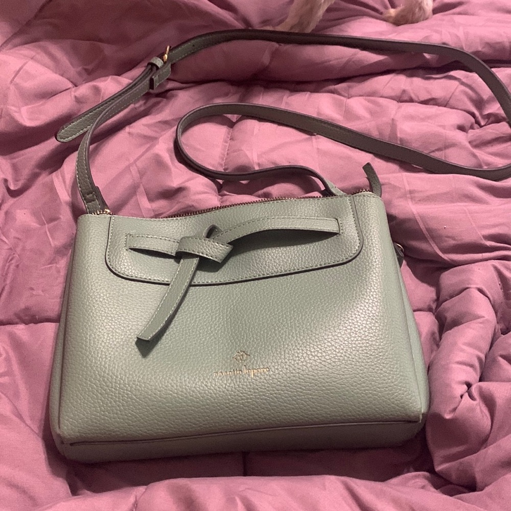 3 compartment crossbody perfect for carrying just your essentials.